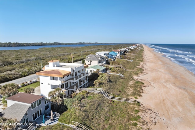 aerial view featuring a beach view and a water view