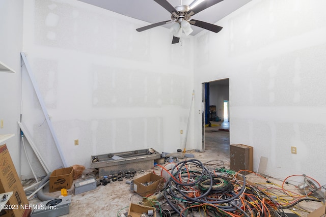 interior space featuring concrete floors and ceiling fan