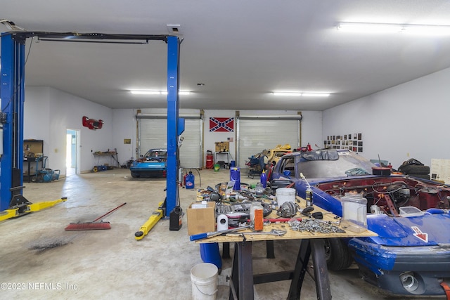 garage with a workshop area