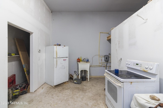 kitchen with sink and white appliances