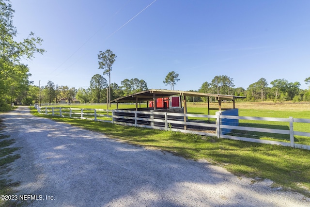 exterior space with a rural view