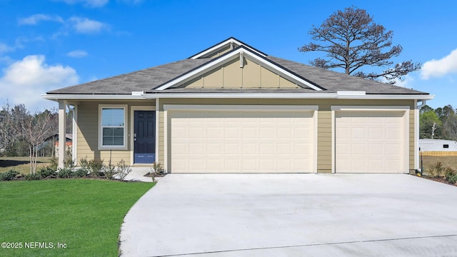 ranch-style home featuring an attached garage, concrete driveway, board and batten siding, and a front yard