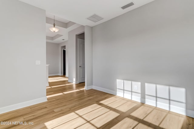 empty room featuring hardwood / wood-style floors