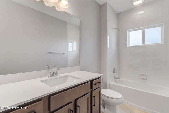 full bathroom featuring tile patterned flooring, vanity, toilet, and washtub / shower combination