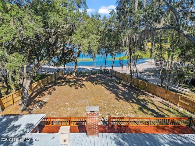 182 Cargo Way, Keystone Heights, FL 32656 - fenced backyard with a deck
