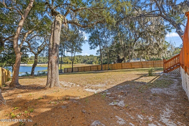 view of yard with a water view