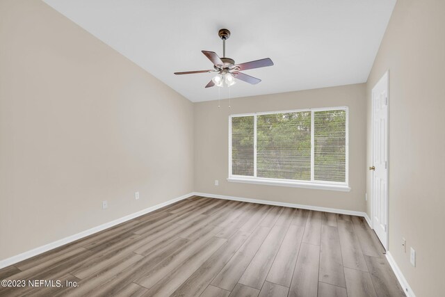 unfurnished room featuring ceiling fan and light hardwood / wood-style floors