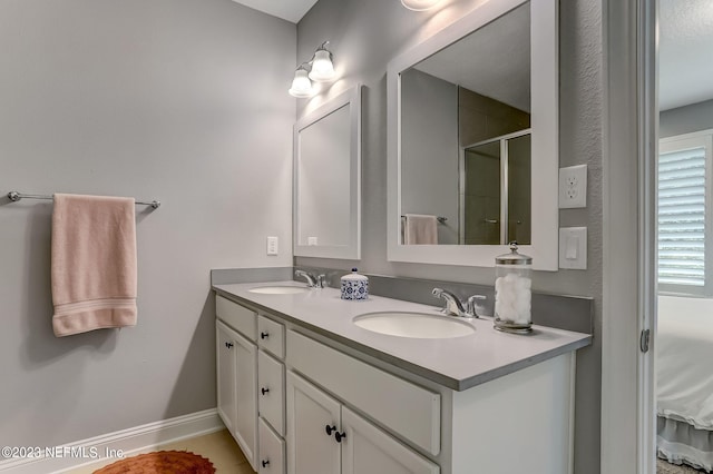 bathroom featuring vanity and walk in shower