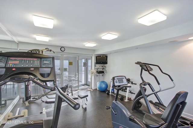 workout area featuring french doors