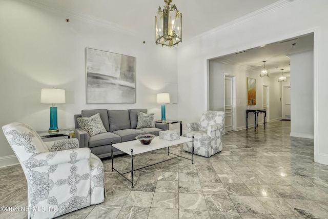 living room with crown molding and a notable chandelier