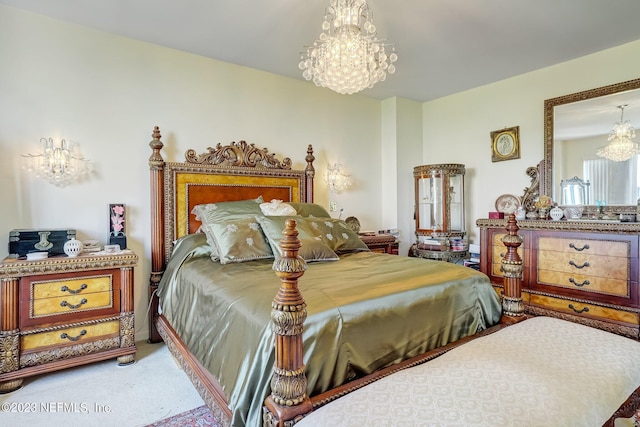 bedroom with carpet flooring and an inviting chandelier