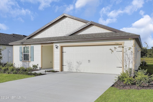 ranch-style home with a garage