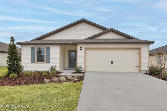 3176 Lowgap Pl, Green Cove Springs, FL 32043 - view of front of house with driveway, a front yard, and a garage