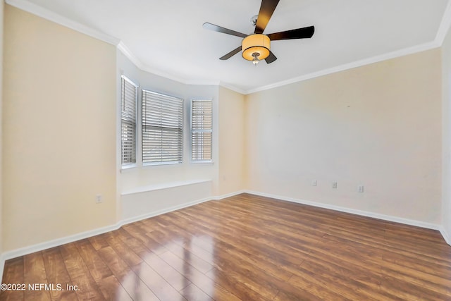 empty room featuring hardwood / wood-style flooring, ceiling fan, and ornamental molding