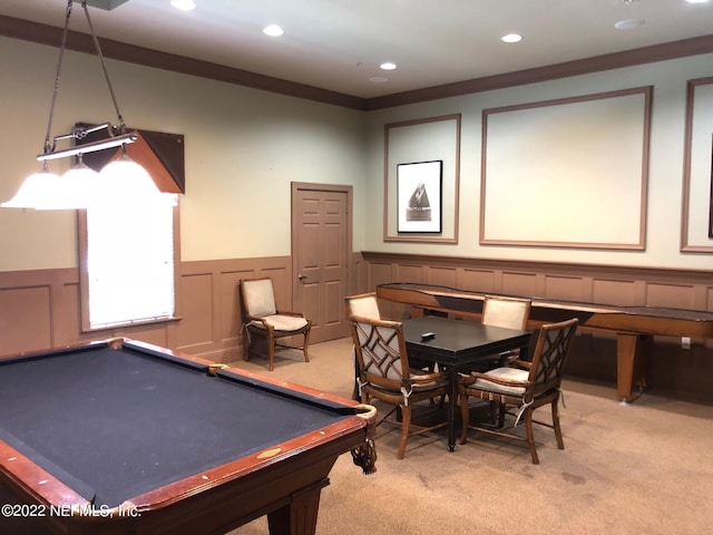 playroom with crown molding and light colored carpet