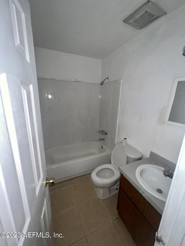 bathroom featuring visible vents, toilet, tile patterned flooring, bathing tub / shower combination, and vanity