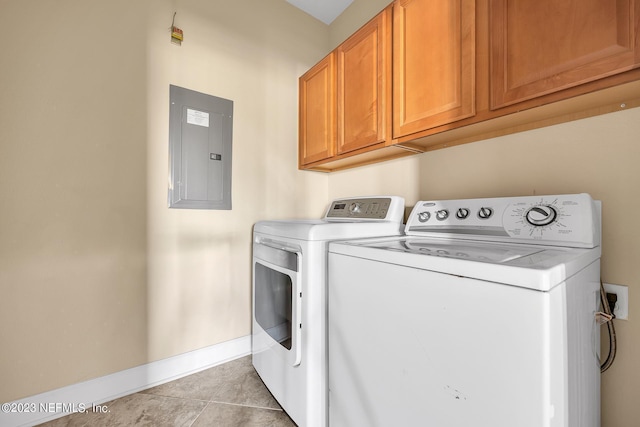 laundry room with light tile patterned floors, cabinet space, electric panel, independent washer and dryer, and baseboards