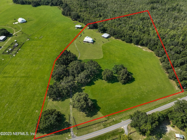 birds eye view of property featuring a rural view