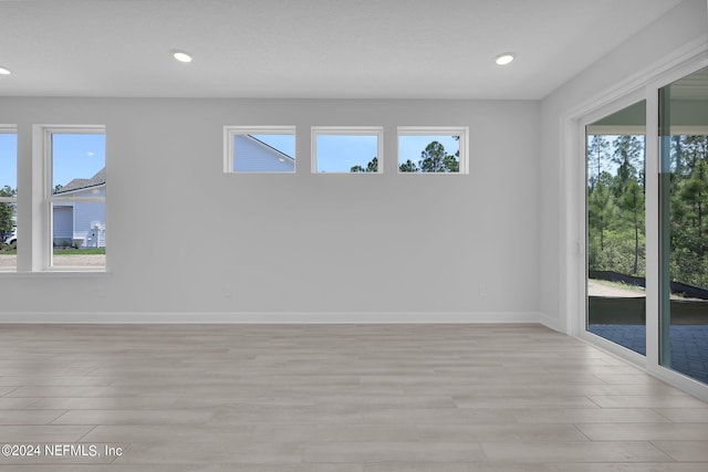 empty room featuring light hardwood / wood-style floors