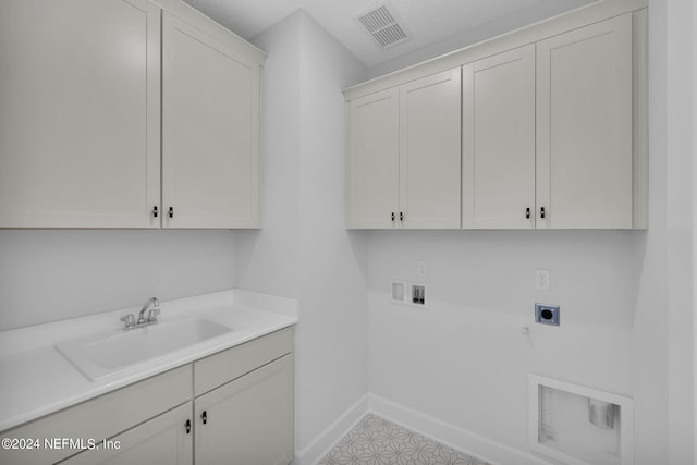 laundry area with cabinets, hookup for a gas dryer, sink, hookup for a washing machine, and hookup for an electric dryer