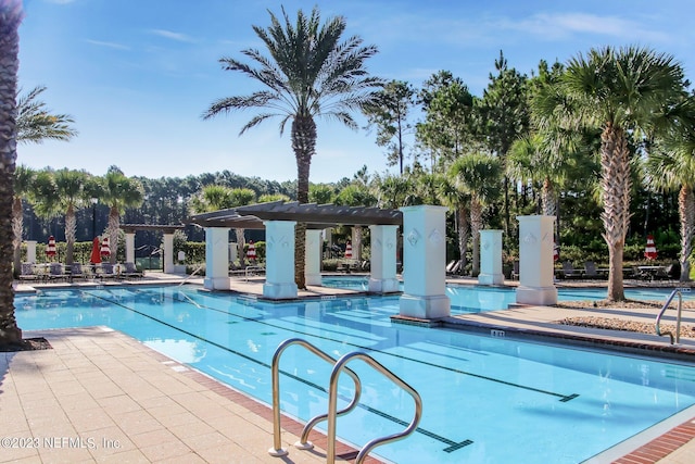 view of pool with a pergola