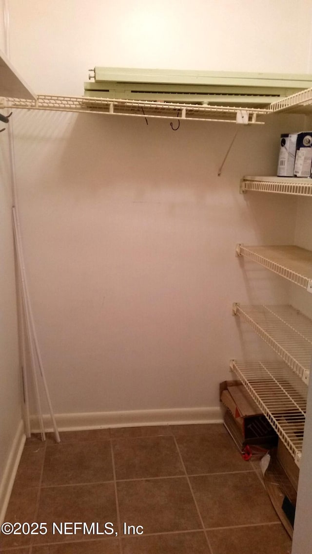 7602 Las Palmas Way Unit 181, Jacksonville, FL 32256 - walk in closet featuring tile patterned floors