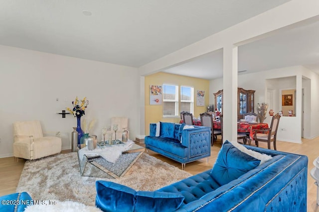 living room with light hardwood / wood-style floors