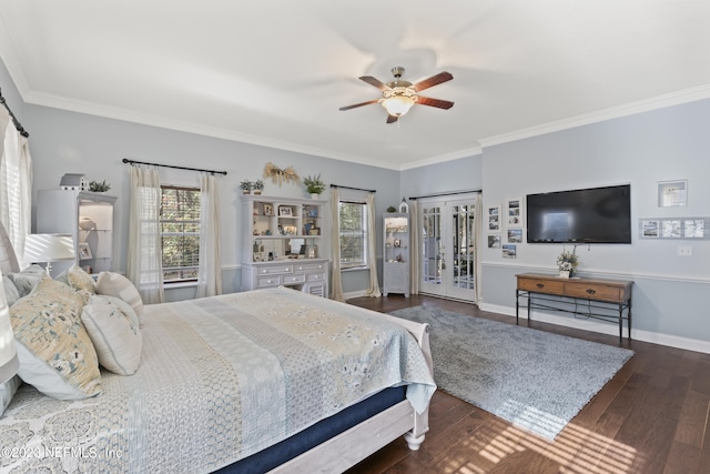 bedroom with french doors, crown molding, dark hardwood / wood-style floors, a closet, and ceiling fan