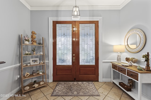 entryway featuring crown molding, tile patterned flooring, and french doors