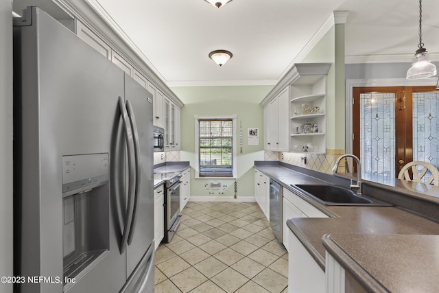 kitchen with sink, crown molding, stainless steel appliances, decorative backsplash, and decorative light fixtures