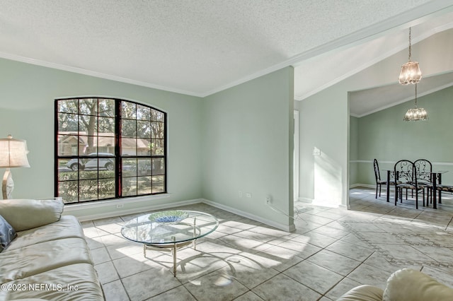 living area featuring a textured ceiling, a chandelier, vaulted ceiling, and crown molding