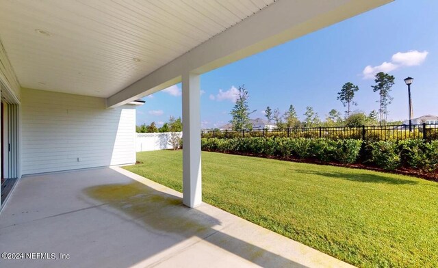 view of yard with a fenced backyard and a patio