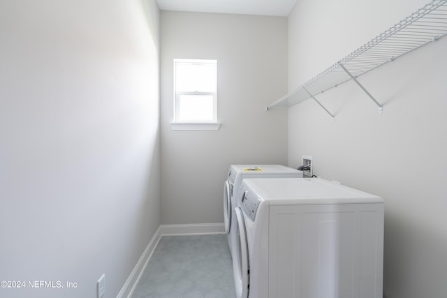 laundry room featuring washer and dryer