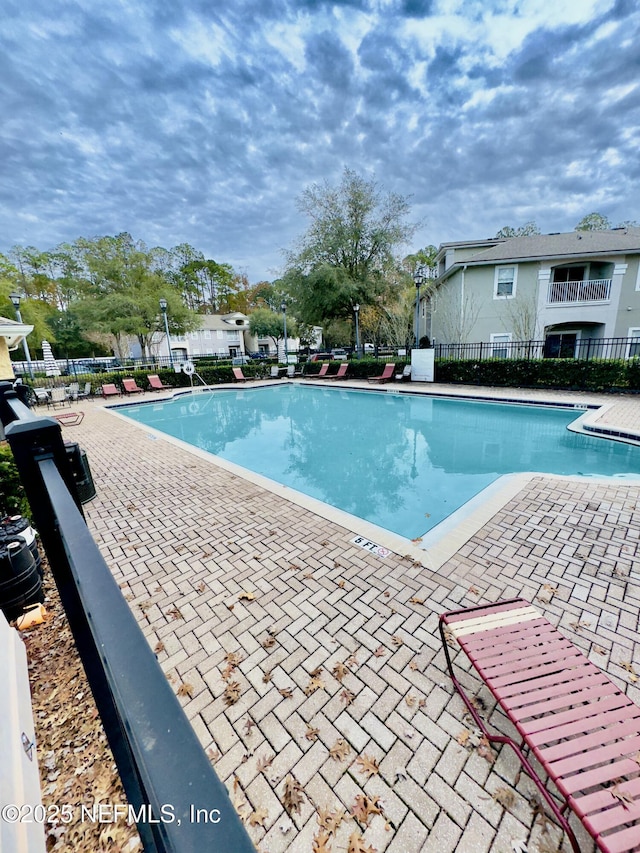 view of pool with a patio area