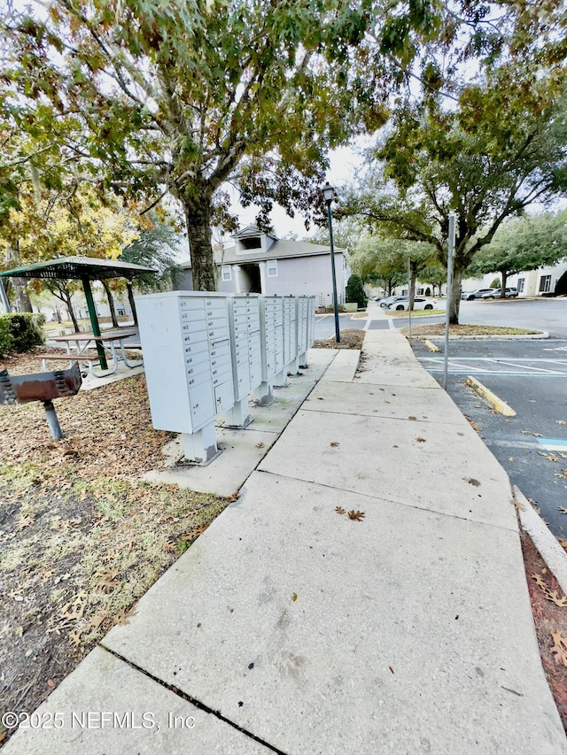 surrounding community featuring a mail area