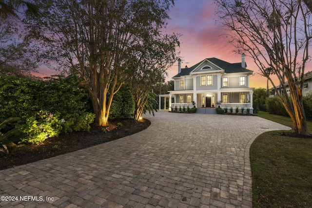 neoclassical / greek revival house with covered porch