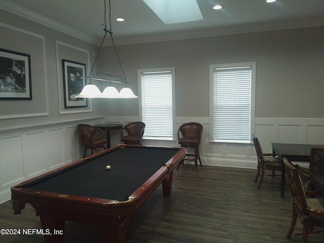 game room featuring dark hardwood / wood-style floors, pool table, and crown molding