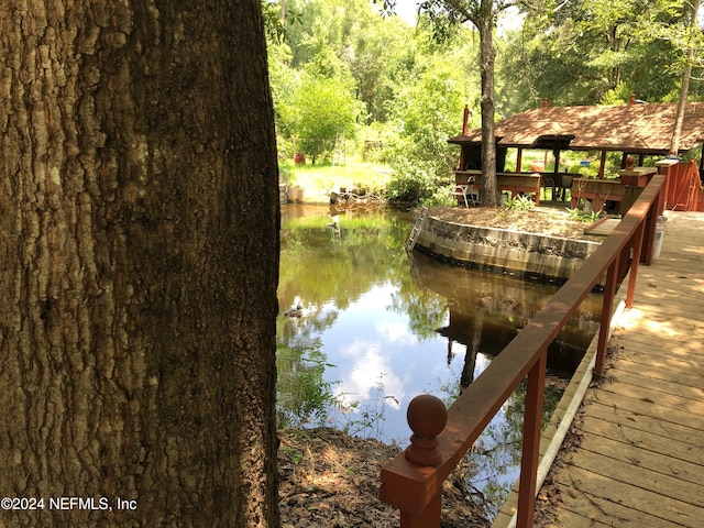 view of dock with a water view