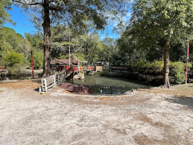 view of yard featuring a water view