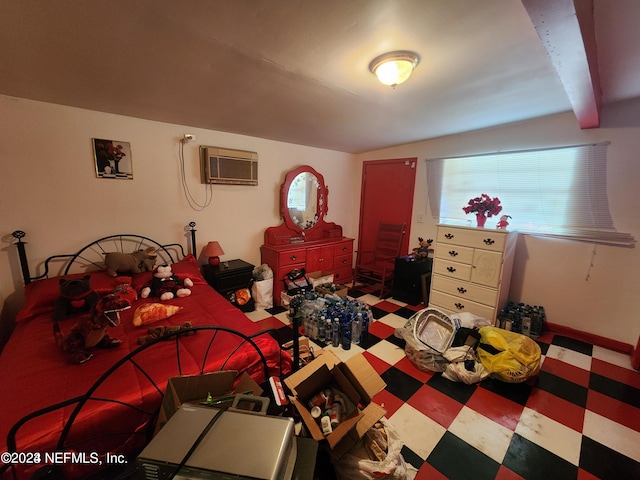 bedroom with lofted ceiling and a wall mounted air conditioner