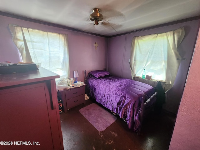 bedroom featuring dark hardwood / wood-style floors and ceiling fan