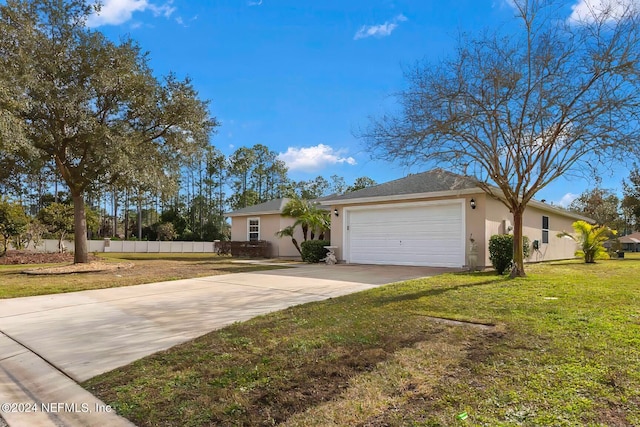 ranch-style house with a front lawn and a garage