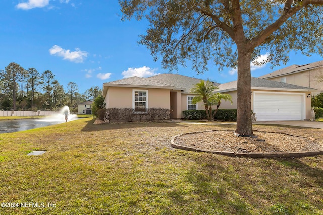 ranch-style home featuring a front lawn and a garage