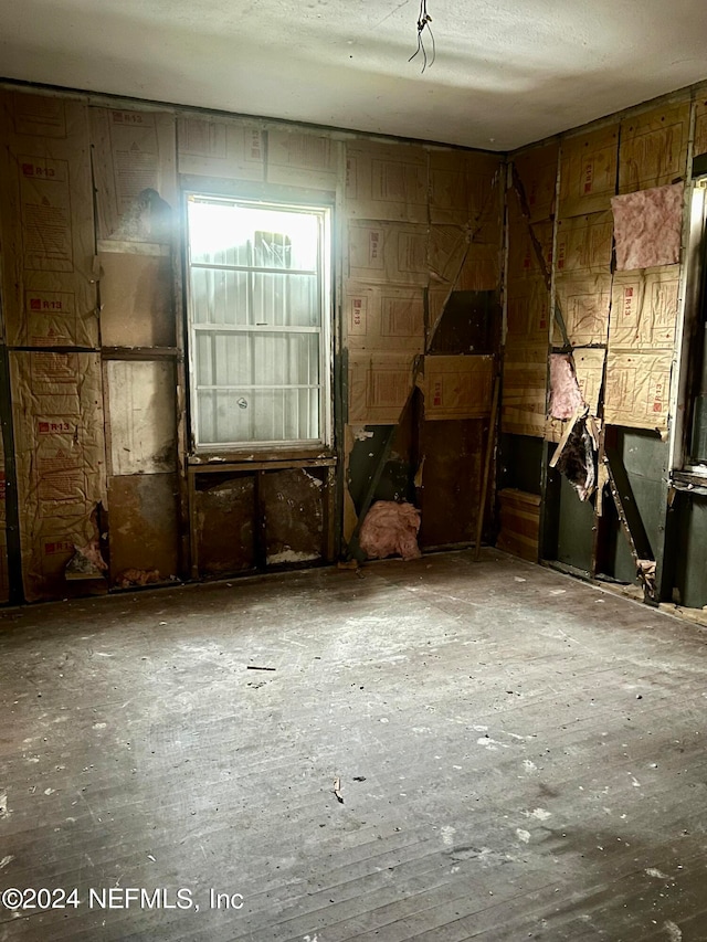 miscellaneous room with a textured ceiling