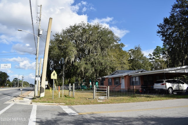 view of front of house with a carport