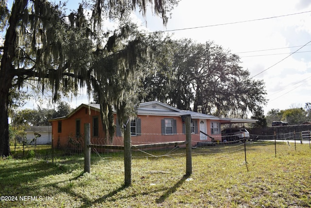 view of property exterior featuring a yard