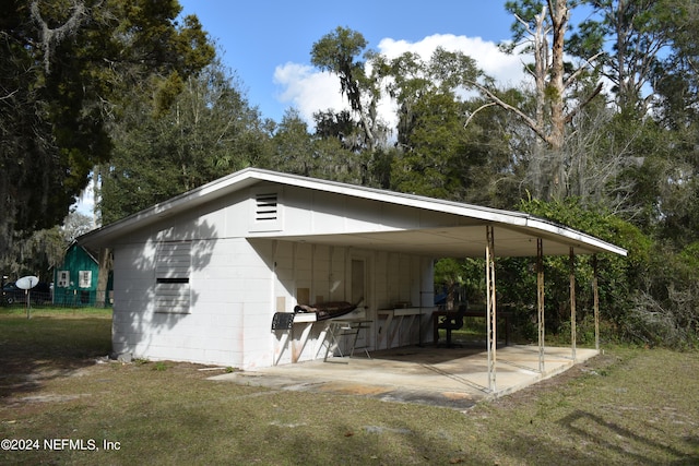 garage with a lawn