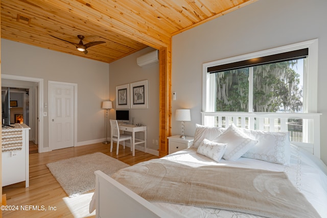 bedroom with wood ceiling, light hardwood / wood-style floors, ceiling fan, and a wall mounted AC