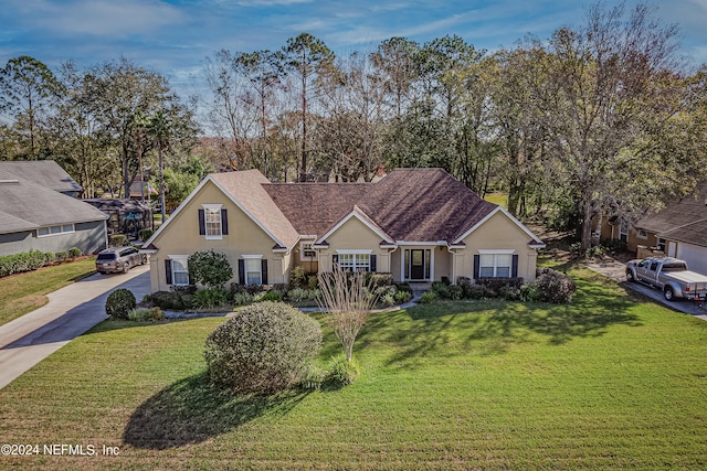 view of front of property with a front lawn