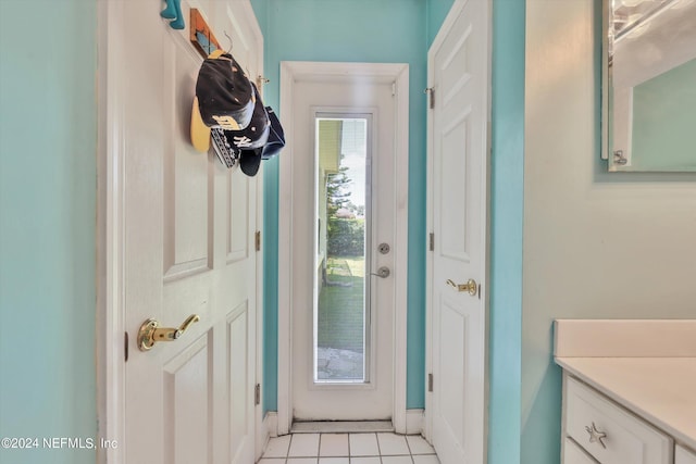 entryway featuring light tile patterned floors